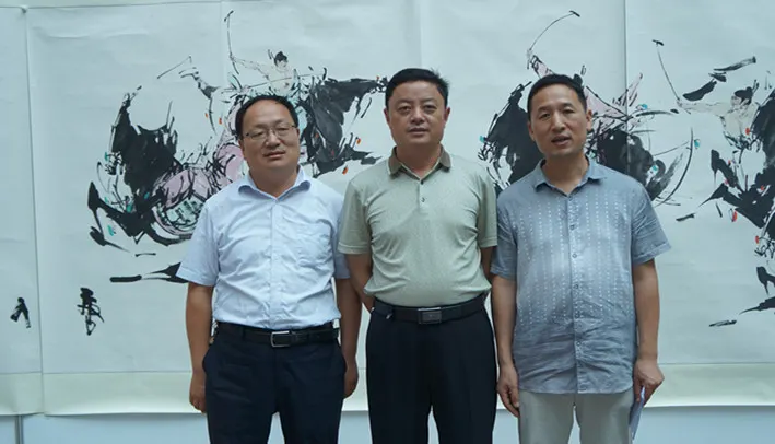 左起:刘建忠、咸振祝、黄勇